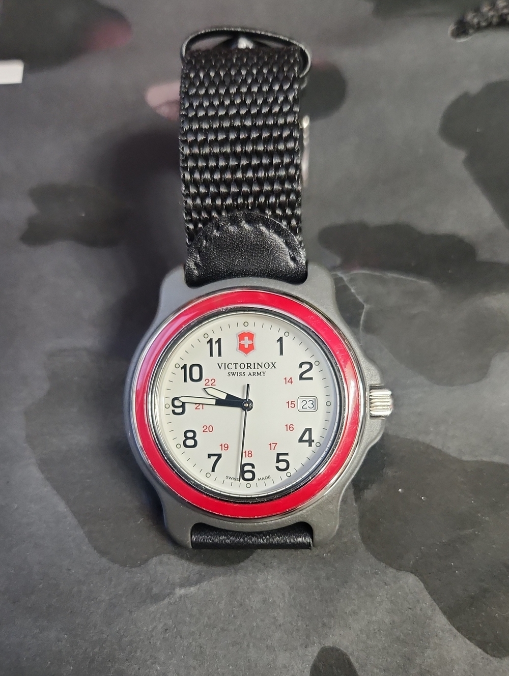 Victorinox Red-Bezel Silver Field Watch with Black Strap